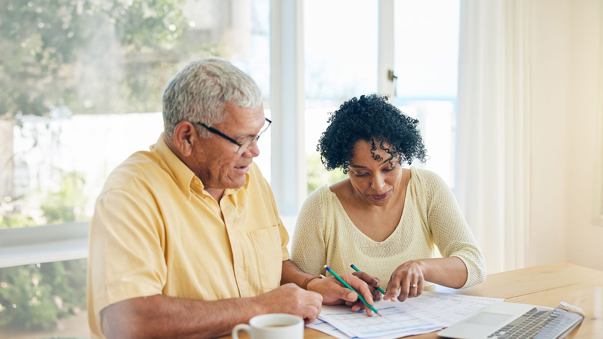 Couple reviews financial plans for retirement
